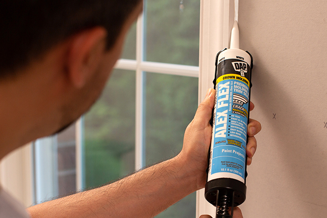 alex flex caulking a window