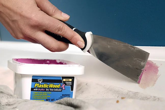 patching imperfection on baseboard